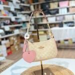 Coog sling bags with heart charm